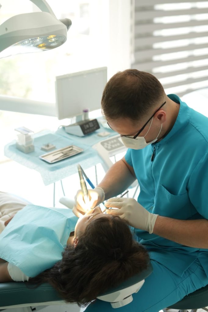 Dentist working in modern dental clinic in Pristina, Den Dent Kosovo